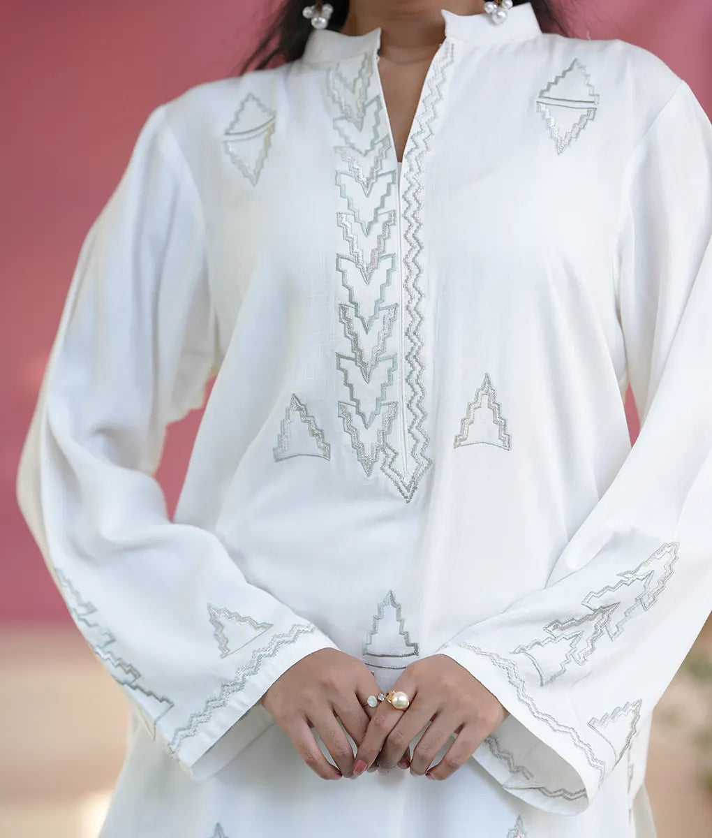 Pure Elegance White Embroidered Ensemble By Winara