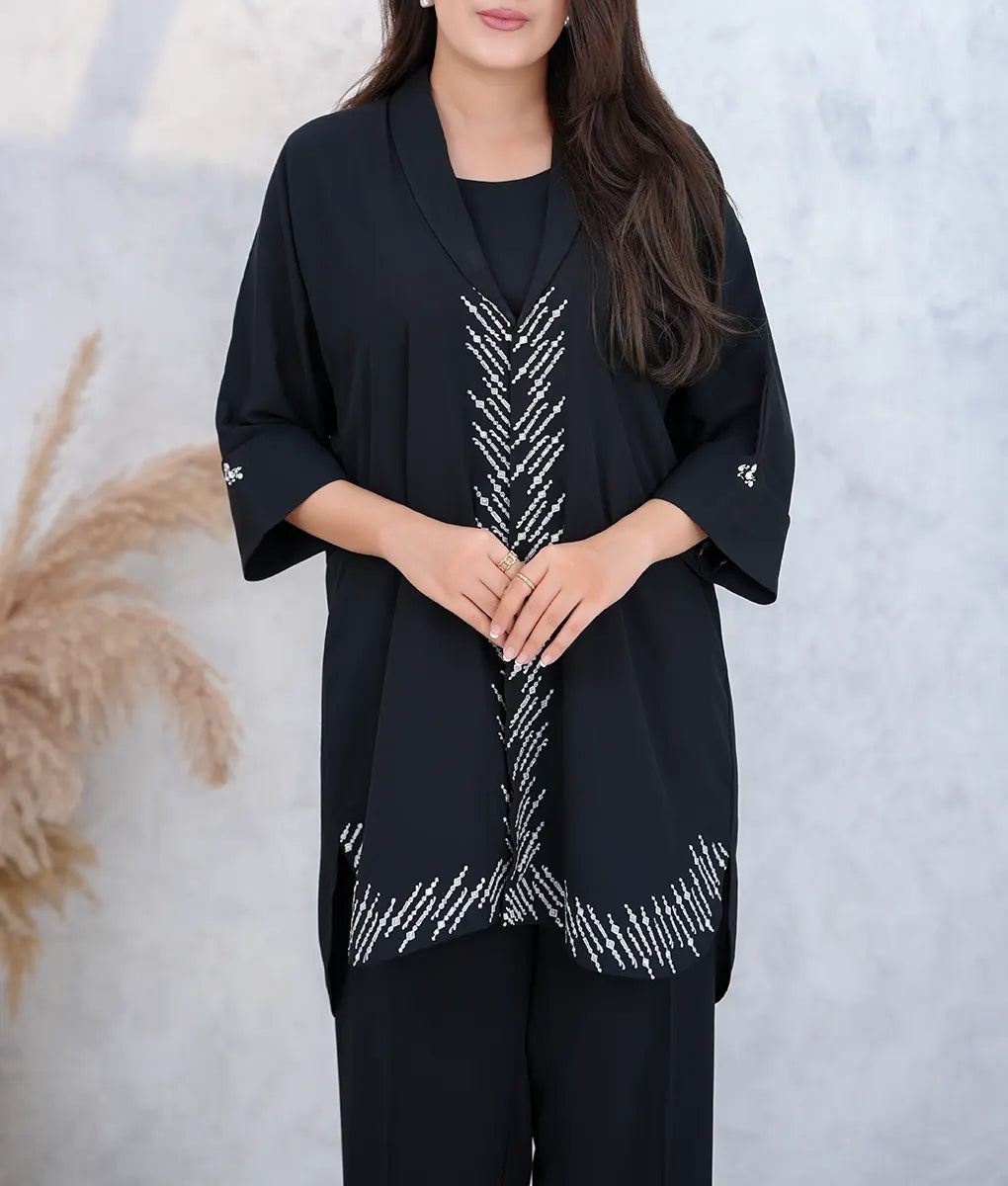 Embroidered Textured Georgette Suit by Winara